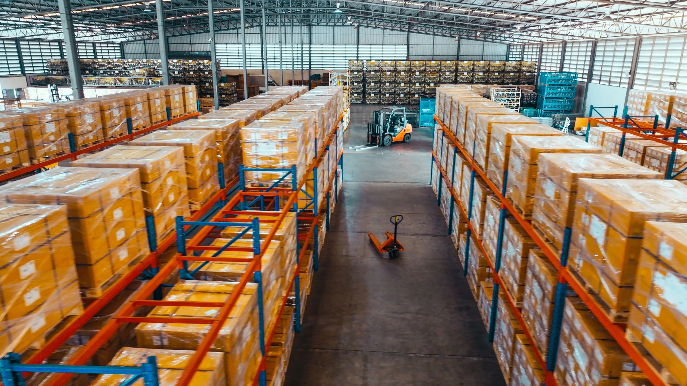Warehouse shelves stocked with packaged goods ready for distribution
